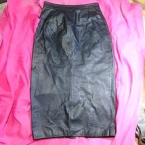Size small pencil black leather skirt.